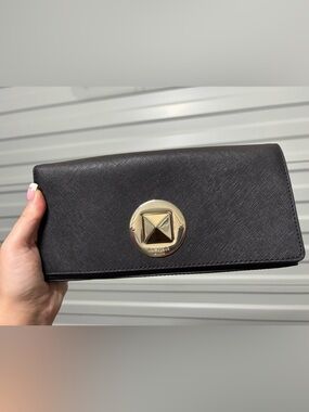 kate spade black saffiano long wallet with gold medallion